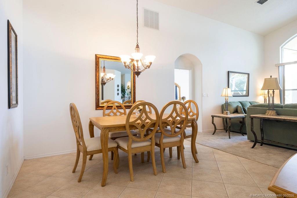 2096 Northwest Marsh Rabbit Lane Stuart, FL 34994 - Photo 41 of 58 a view of a dining room with furniture