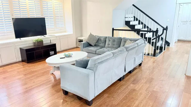 a bedroom with a bed and a window with outer view