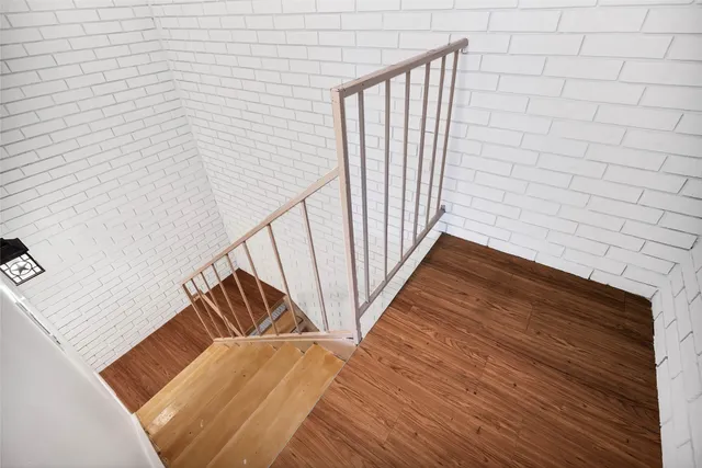 a view of a chairs and table in the patio