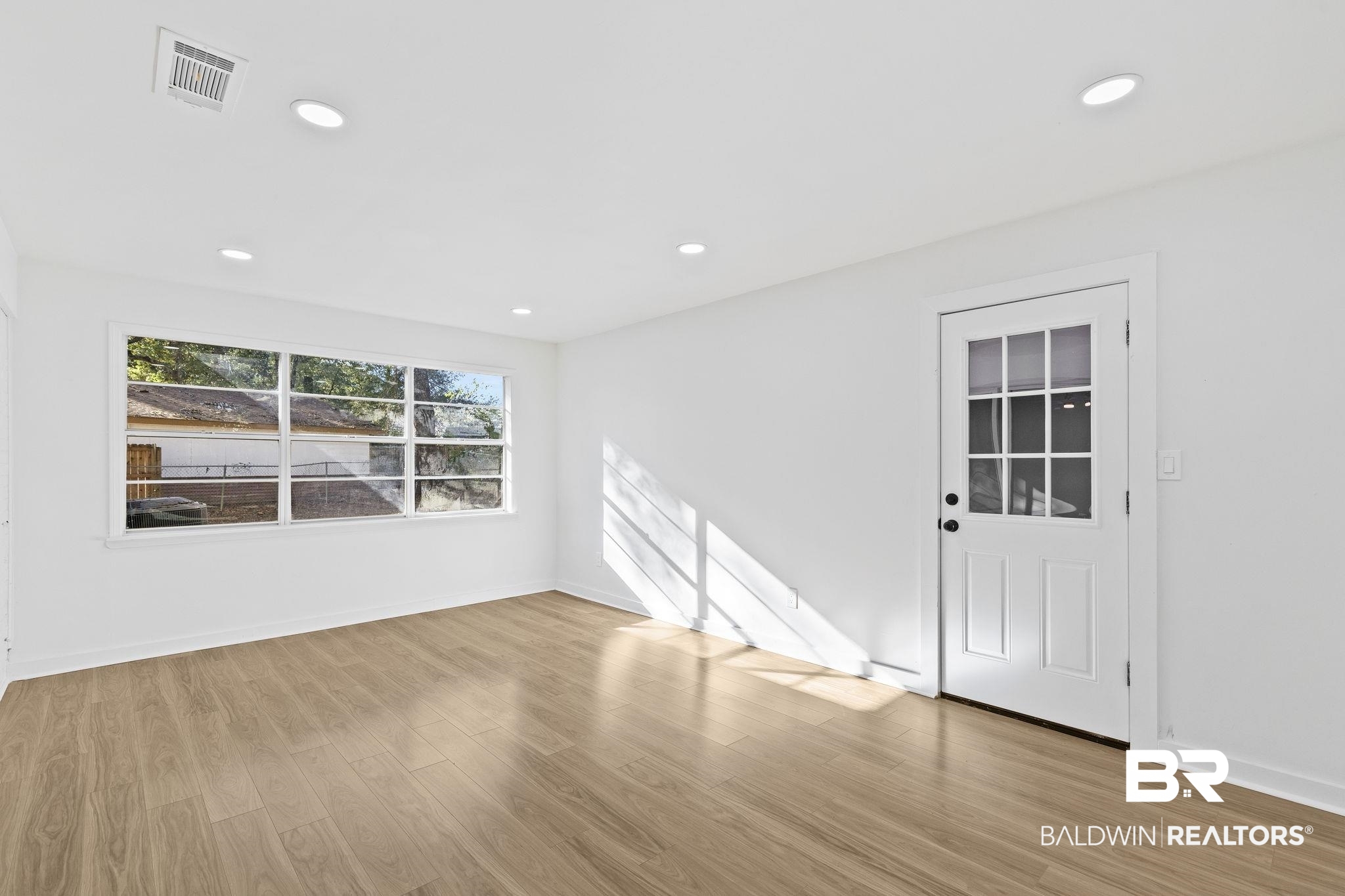 5398 Quail Run North Theodore, AL 36582 - Photo 27 of 46 Spare room with light hardwood / wood-style floors