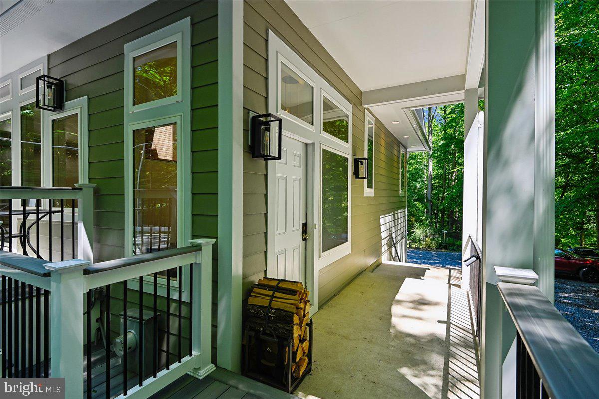 3633 Patuxent River Road Davidsonville, MD 21035 - Photo 15 of 85 Side Entry w/Transom Windows and Exterior Lighting