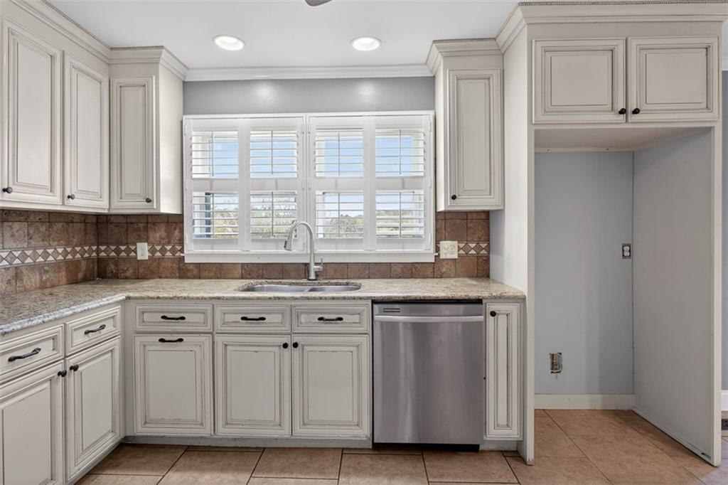 3 Berkshire Lane Rome, GA 30161 - Photo 15 of 44 a kitchen with white cabinets and sink