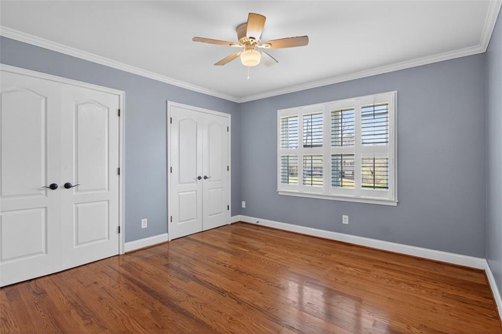 3 Berkshire Lane Rome, GA 30161 - Photo 17 of 44 a view of empty room with wooden floor and fan