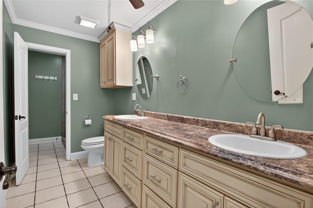 3 Berkshire Lane Rome, GA 30161 - Photo 19 of 44 a bathroom with a granite countertop sink mirror and toilet