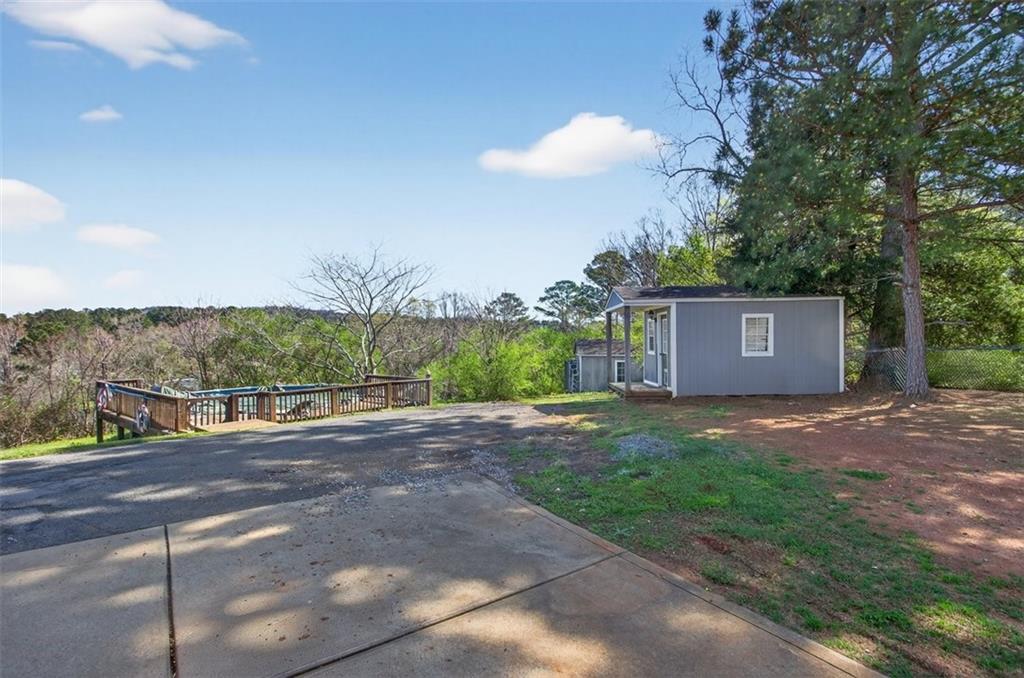 3 Berkshire Lane Rome, GA 30161 - Photo 32 of 44 a view of a house with a yard and garage