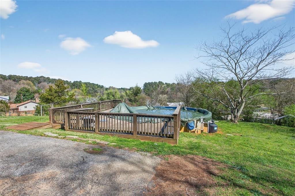 3 Berkshire Lane Rome, GA 30161 - Photo 34 of 44 a view of a garden with a slide