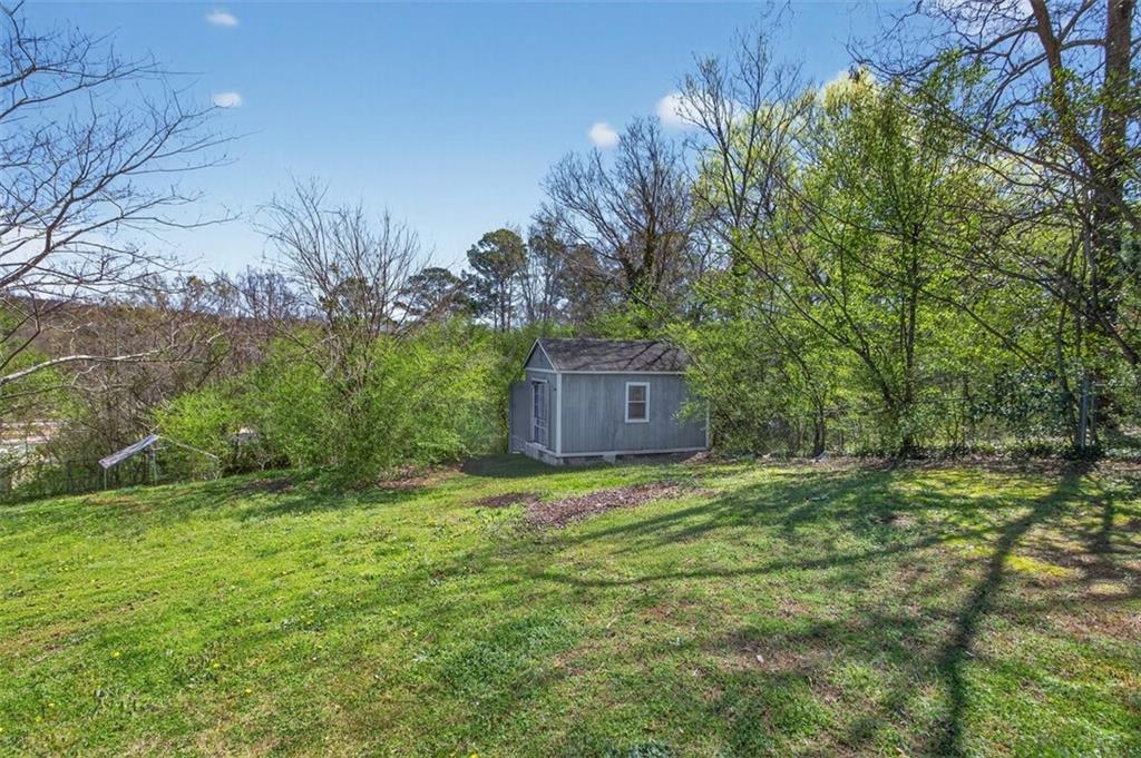 3 Berkshire Lane Rome, GA 30161 - Photo 35 of 44 a big yard with lots of green space and plants
