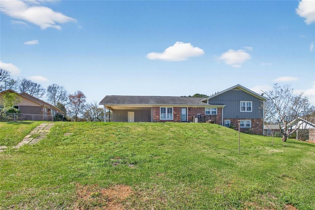 3 Berkshire Lane Rome, GA 30161 - Photo 37 of 44 a view of a house with a big yard and large trees