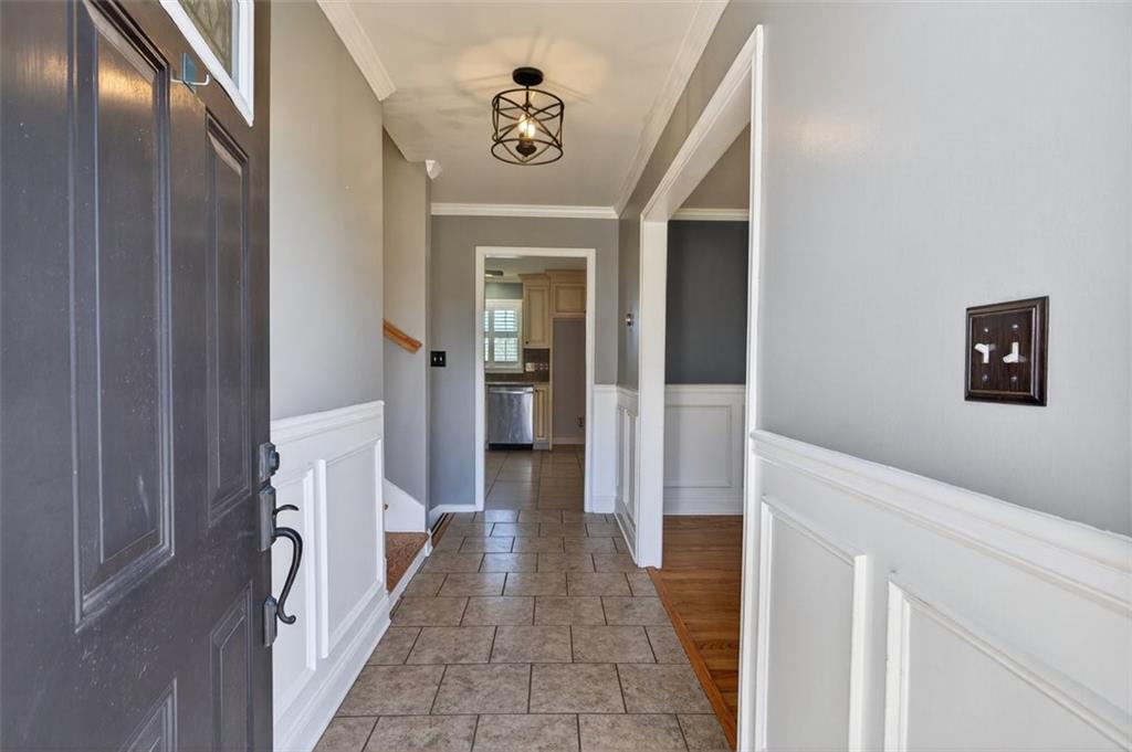 3 Berkshire Lane Rome, GA 30161 - Photo 4 of 44 a view of a hallway with wooden floor and staircase