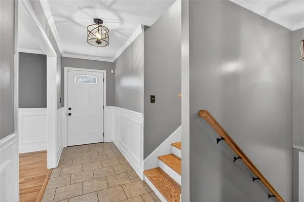 a view of a hallway with front door