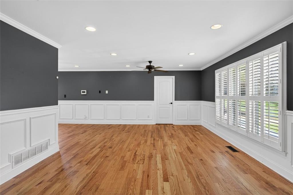 3 Berkshire Lane Rome, GA 30161 - Photo 6 of 44 a view of a big room with wooden floor and windows