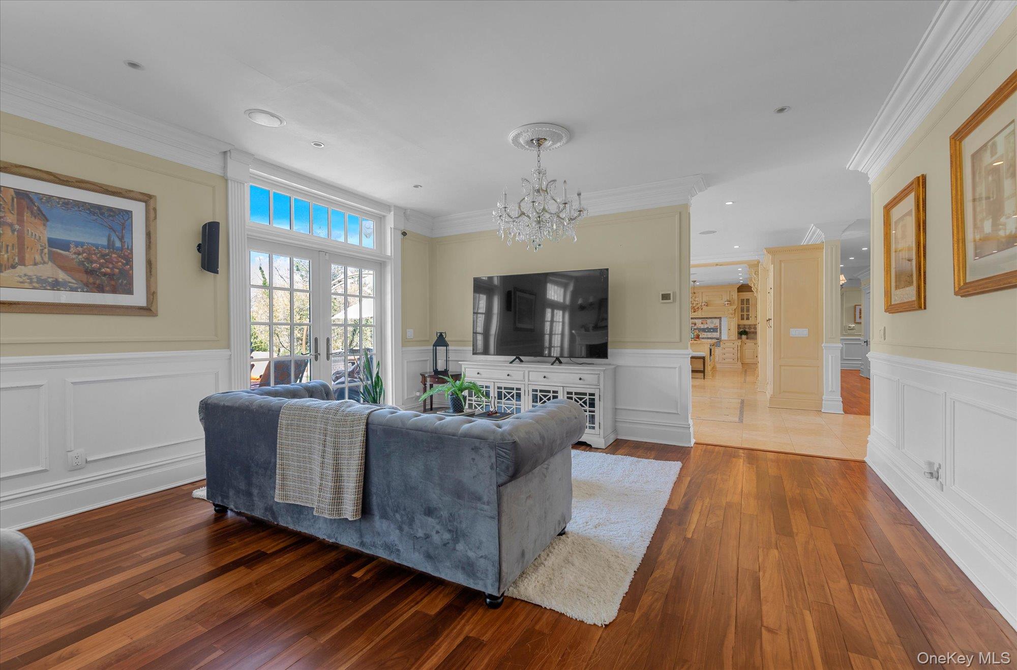 8 Norgate Road Glen Head, NY 11545 - Photo 14 of 37 a living room with furniture and a flat screen tv