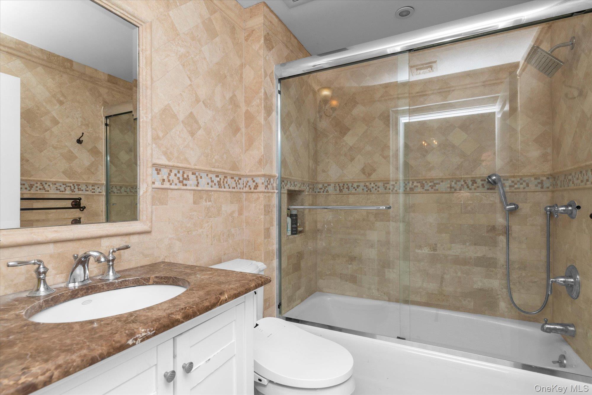 8 Norgate Road Glen Head, NY 11545 - Photo 25 of 37 a bathroom with a granite countertop sink toilet and shower