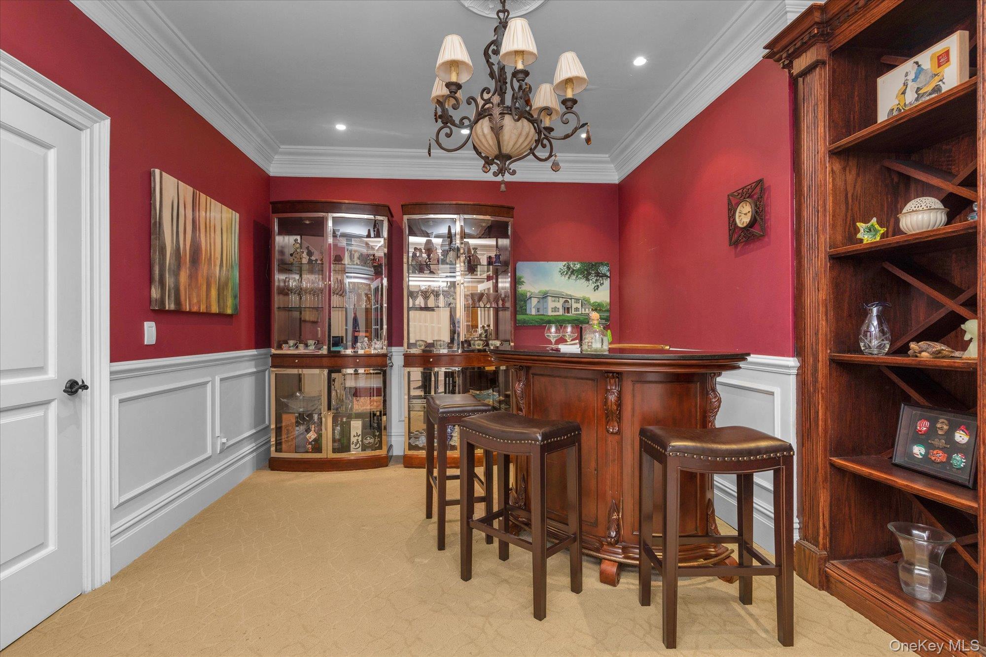 8 Norgate Road Glen Head, NY 11545 - Photo 26 of 37 a view of a dining room with furniture and chandelier
