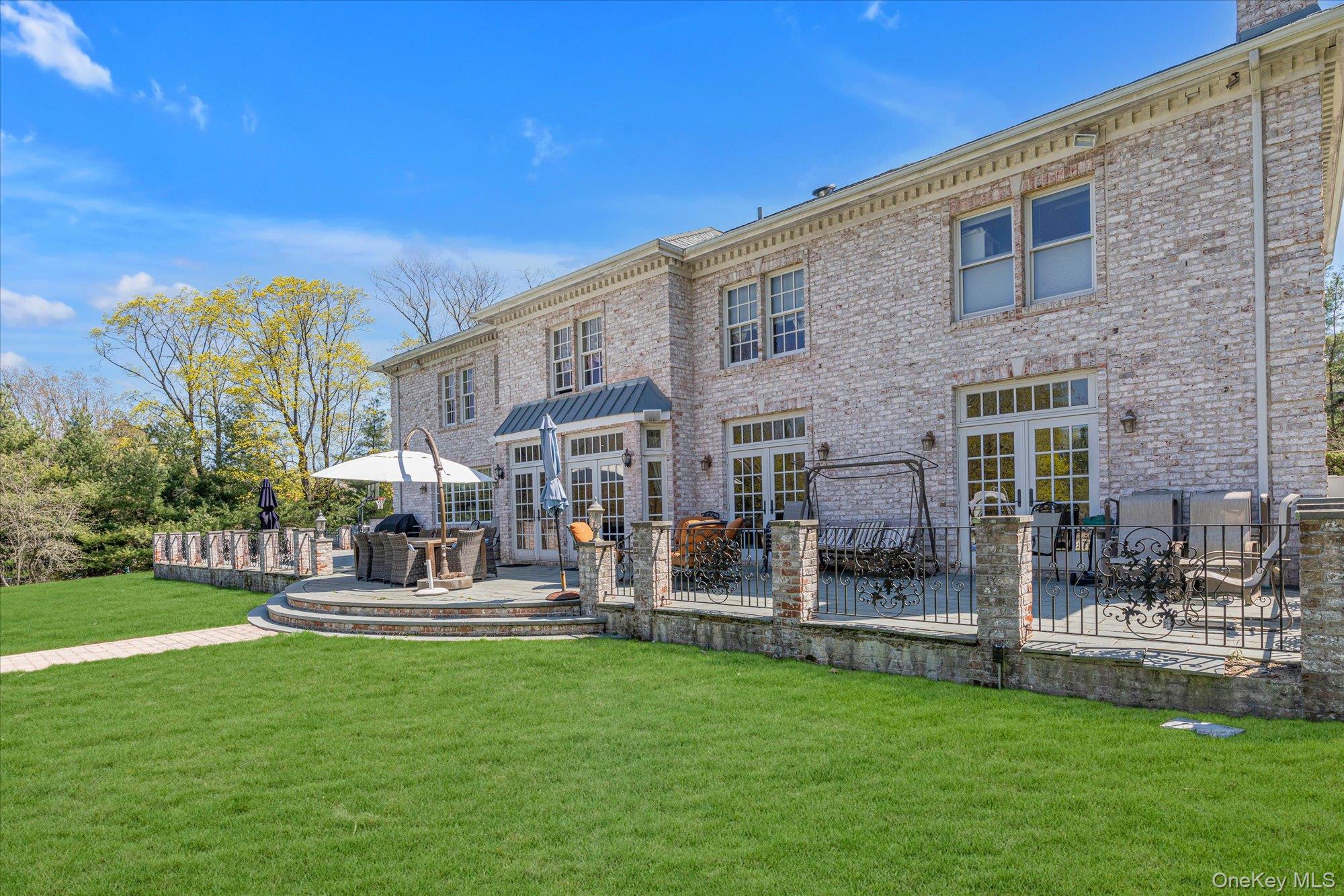 8 Norgate Road Glen Head, NY 11545 - Photo 29 of 37 a view of a building with a yard