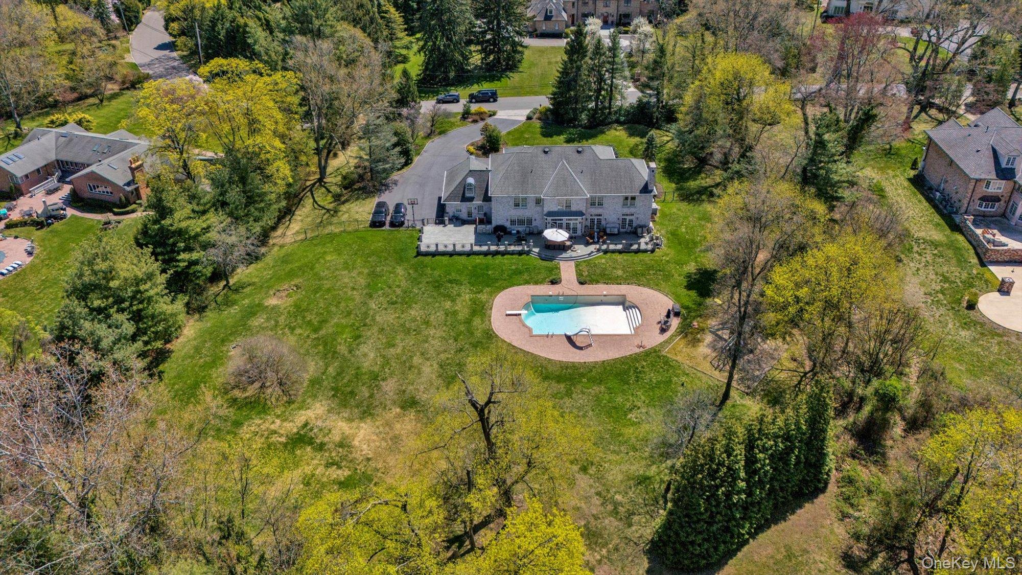 8 Norgate Road Glen Head, NY 11545 - Photo 34 of 37 an aerial view of a house with a swimming pool and garden view