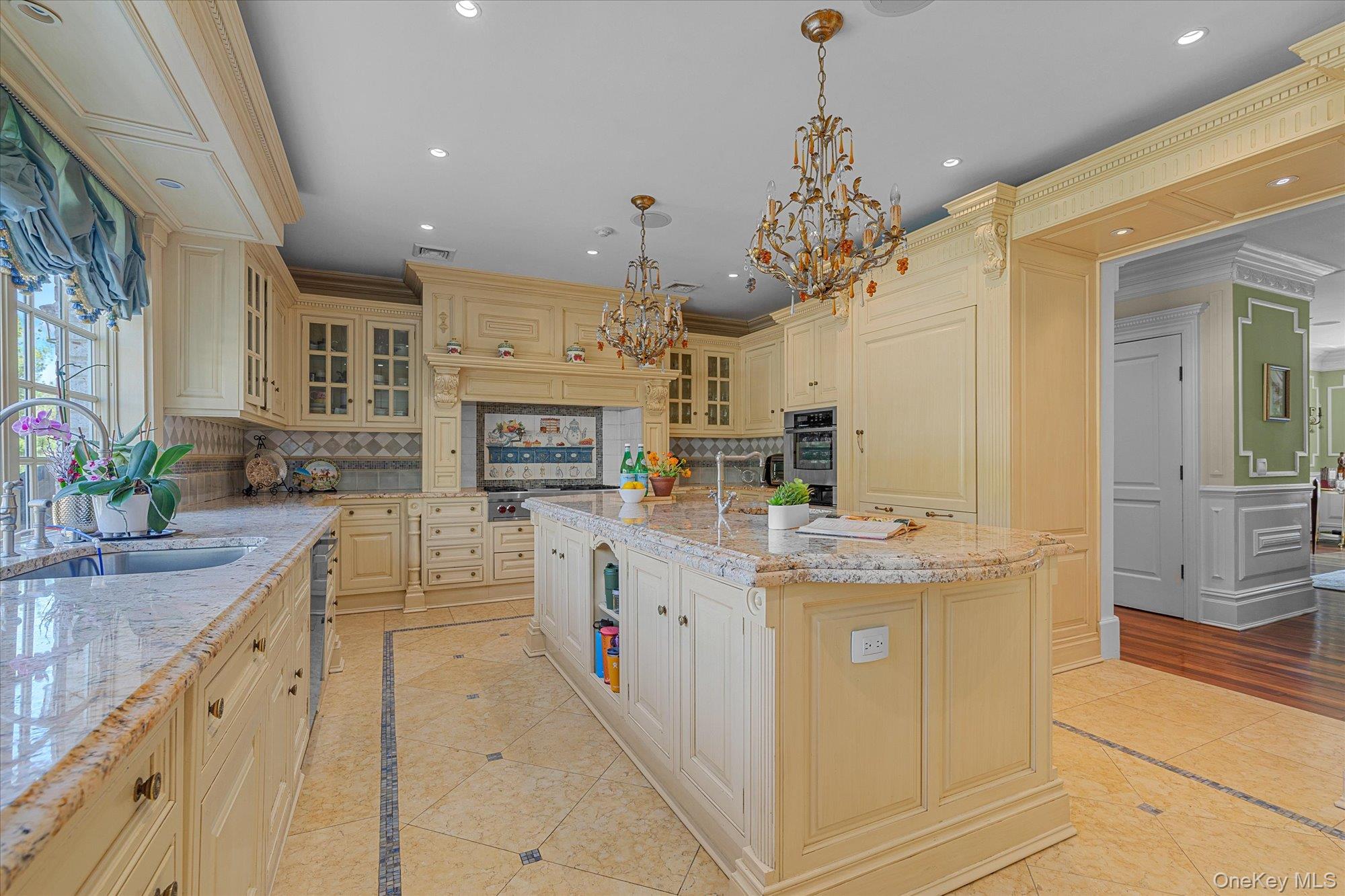8 Norgate Road Glen Head, NY 11545 - Photo 8 of 37 a kitchen with stainless steel appliances granite countertop a sink and cabinets