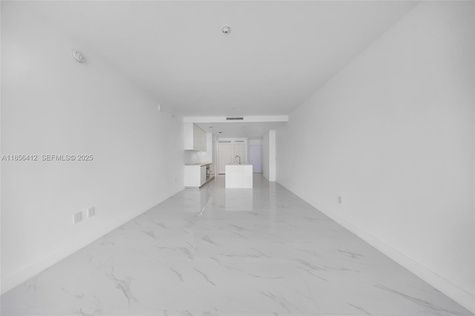 700 Northeast 24th Street, Unit 2704 Miami, FL 33137 - Photo 22 of 88 a view of a room with white walls