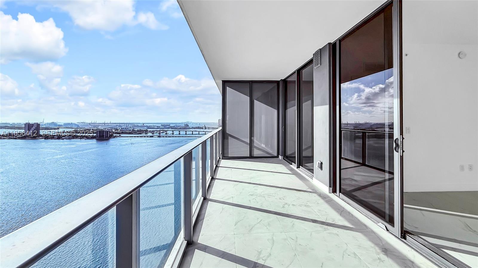 700 Northeast 24th Street, Unit 2704 Miami, FL 33137 - Photo 3 of 88 a balcony with an outdoor seating space