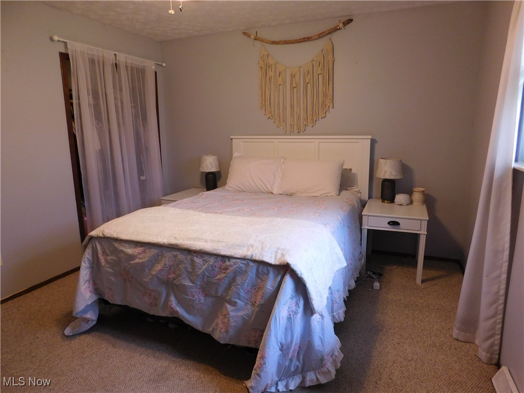 8754 Root Road North Ridgeville, OH 44039 - Photo 22 of 39 View of carpeted bedroom