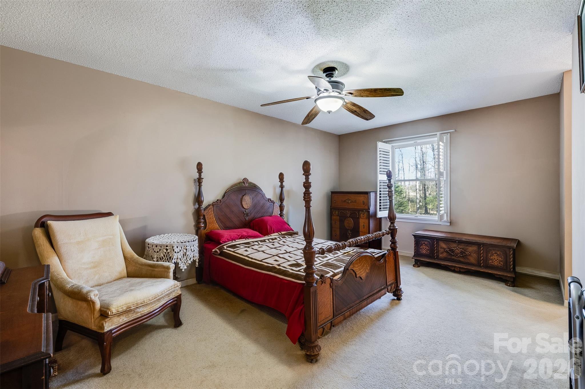 188 Oak Forest Circle Gaffney, SC 29341 - Photo 14 of 24 a bedroom with a bed couch and a window