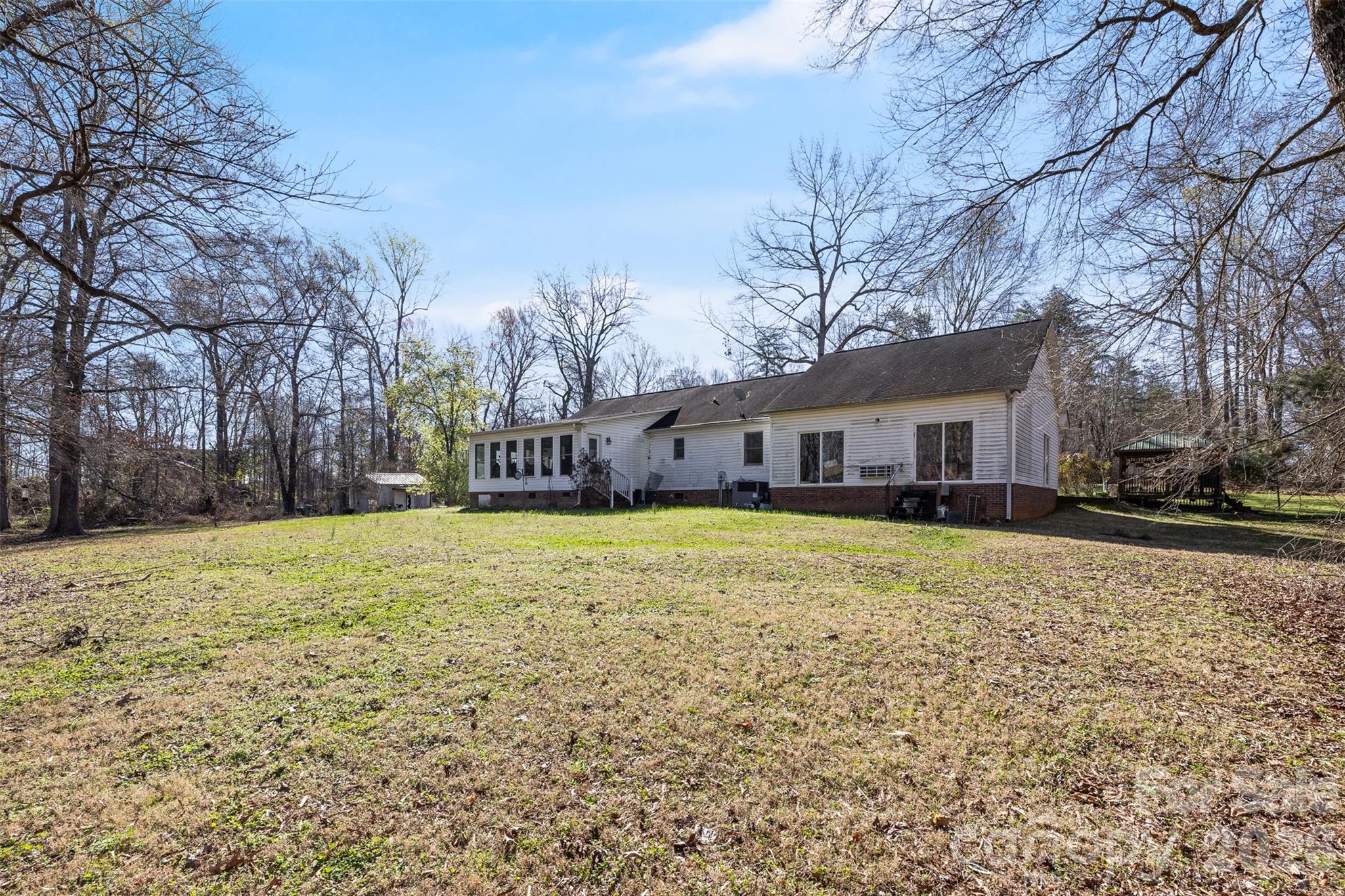 188 Oak Forest Circle Gaffney, SC 29341 - Photo 20 of 24 a front view of house with yard space and trees around