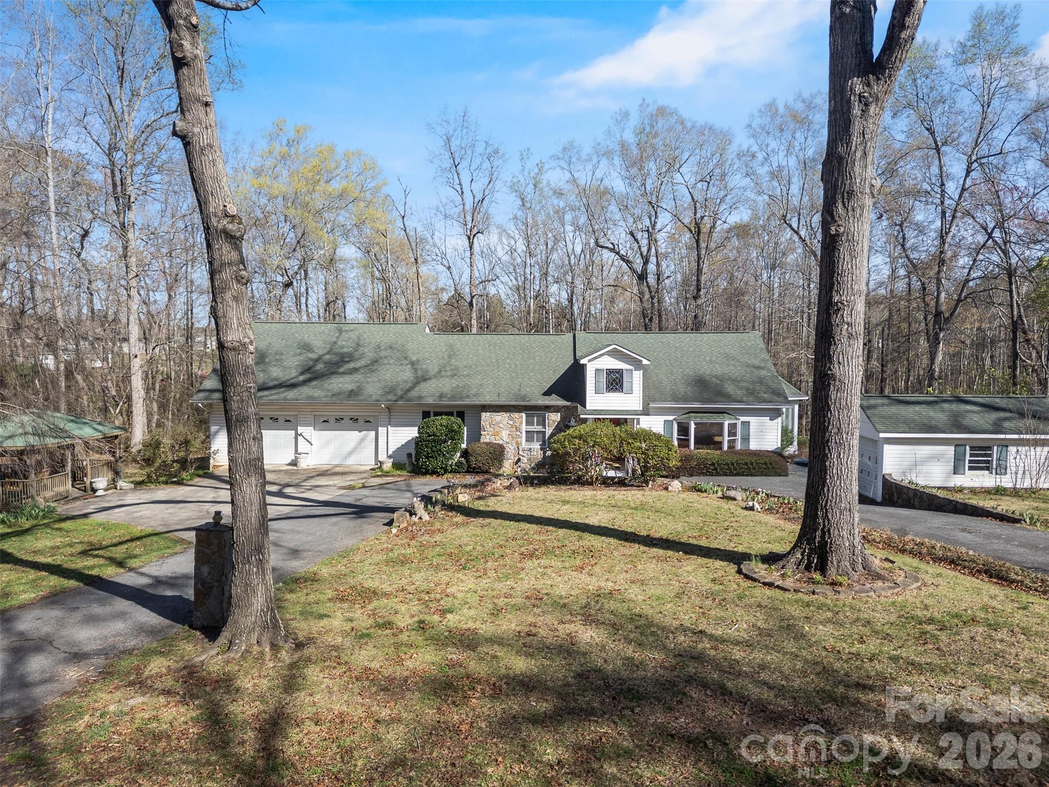 188 Oak Forest Circle Gaffney, SC 29341 - Photo 2 of 24 a view of a house with backyard and trees