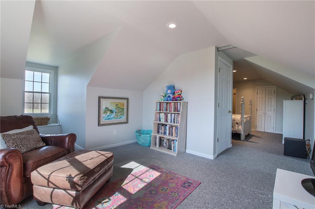 9252 Riverside Road Seagrove, NC 27341 - Photo 22 of 30 Upstairs used as bonus room & 4th BR, walk-in closet, half bath