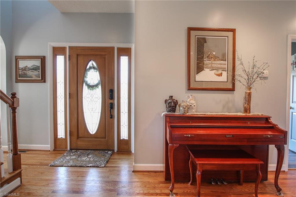 9252 Riverside Road Seagrove, NC 27341 - Photo 10 of 30 Front door, stairway