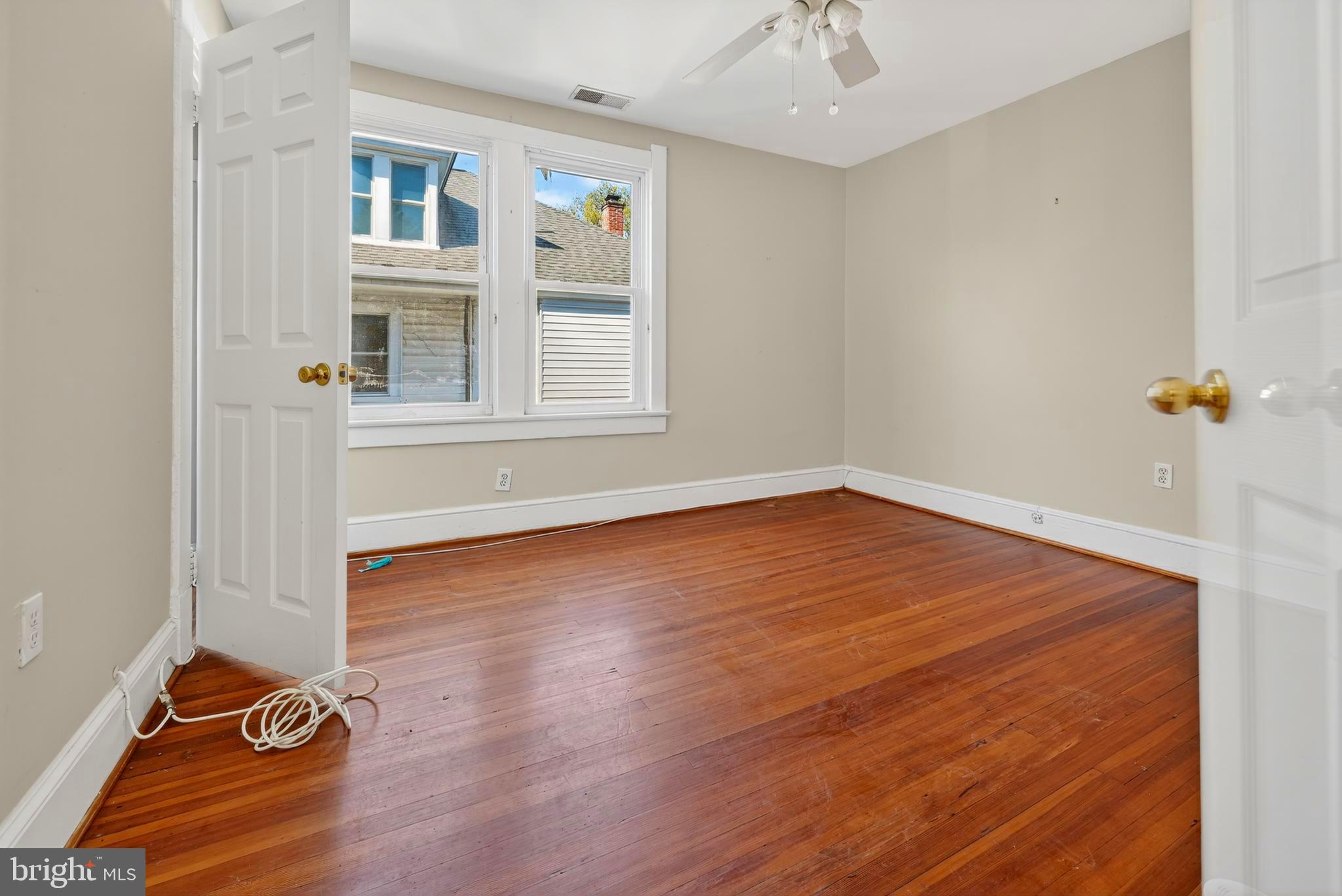 1211 Delafield Place Northwest Washington, DC 20011 - Photo 17 of 28 a view of empty room with cabinet and window