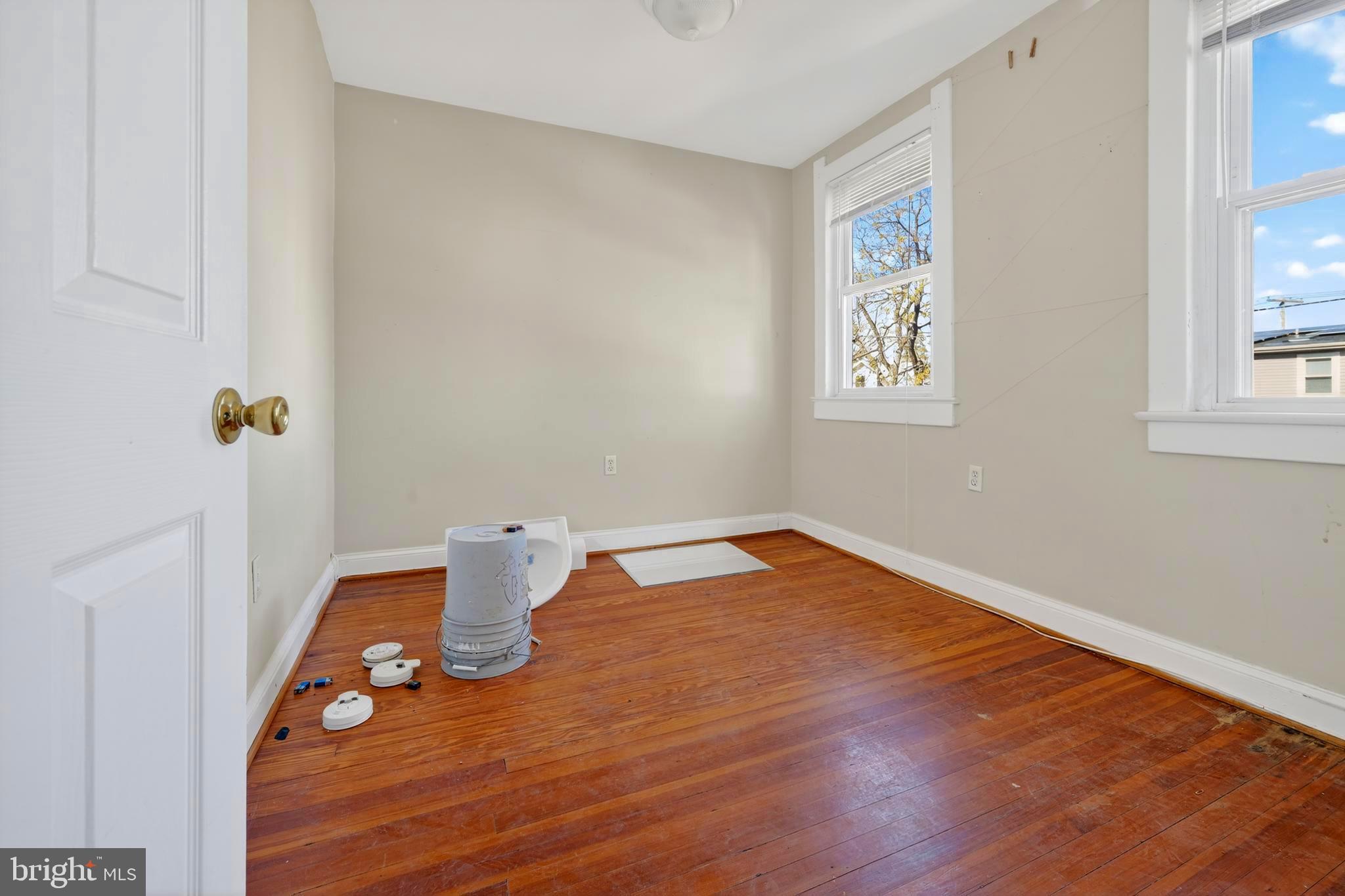 1211 Delafield Place Northwest Washington, DC 20011 - Photo 20 of 28 a view of empty room with wooden floor