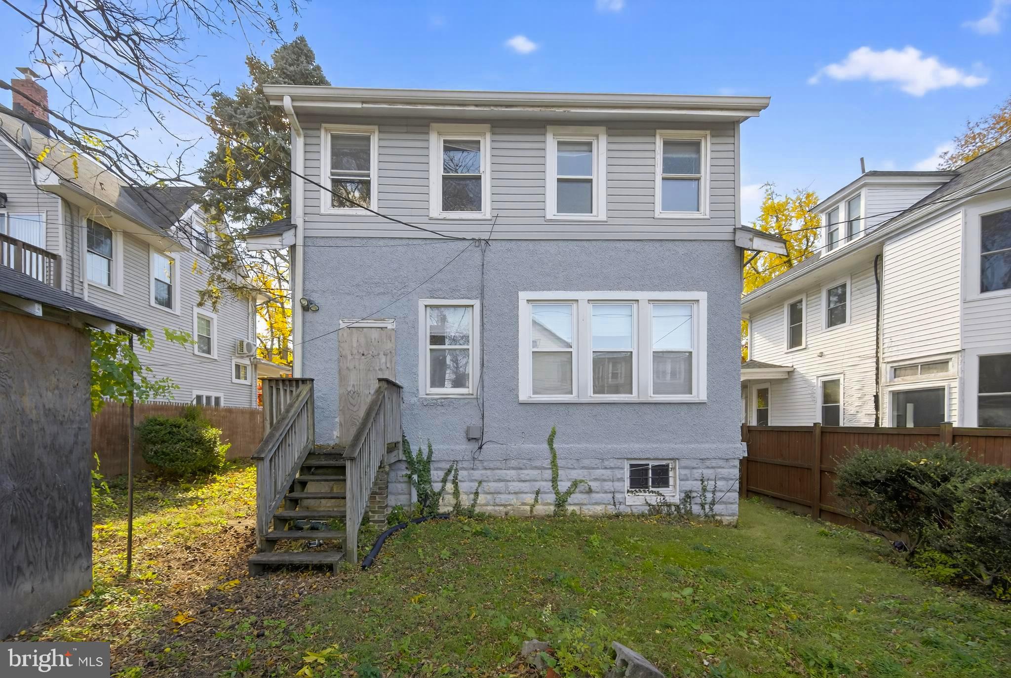 1211 Delafield Place Northwest Washington, DC 20011 - Photo 4 of 28 a view of a house with a yard and a patio