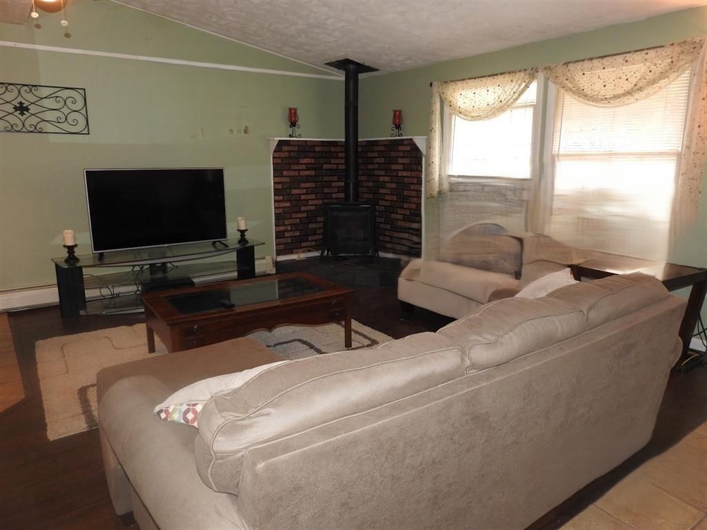 725 State Street Oneonta, NY 13820 - Photo 13 of 25 Another view of living room area when seller first