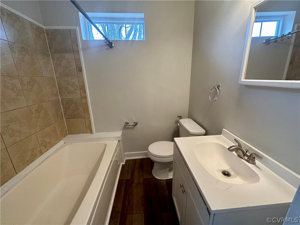 1417 Williamsburg Road Richmond, VA 23231 - Photo 20 of 35 a bathroom with a sink a toilet and shower
