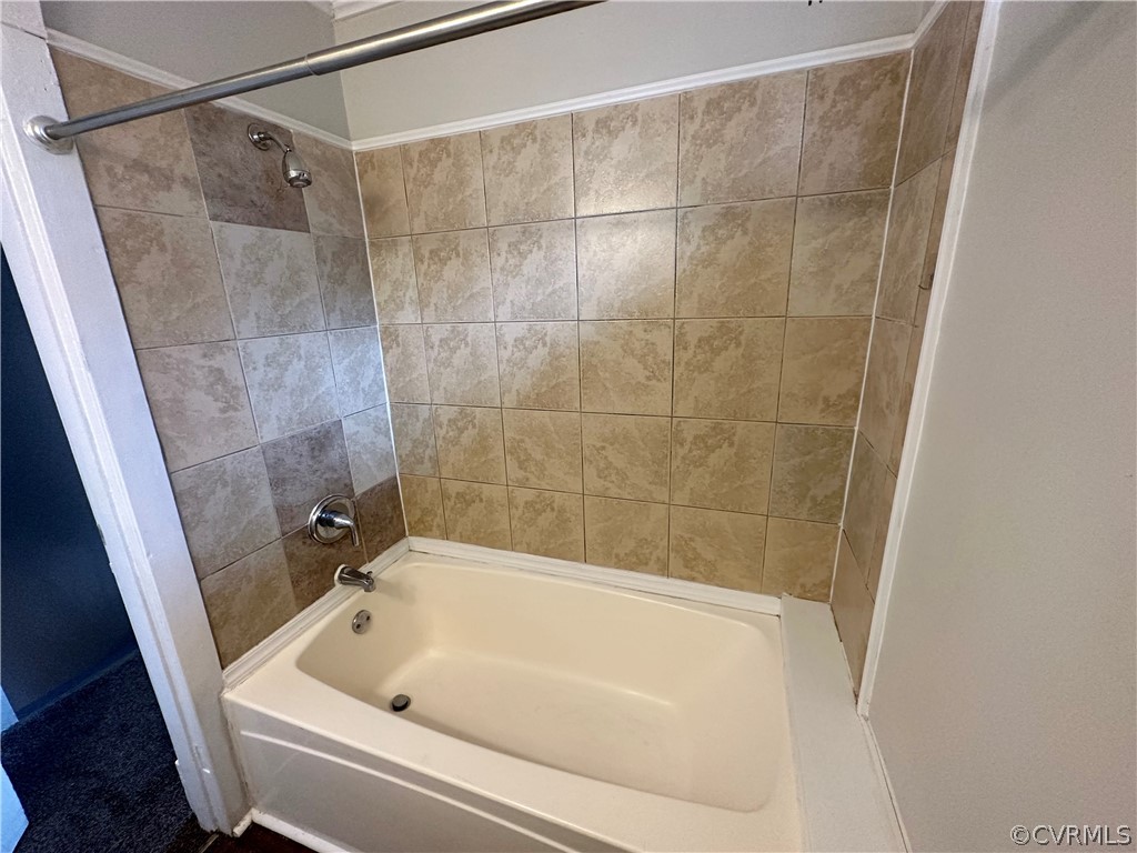 1417 Williamsburg Road Richmond, VA 23231 - Photo 21 of 35 a bathroom with a bathtub and a shower