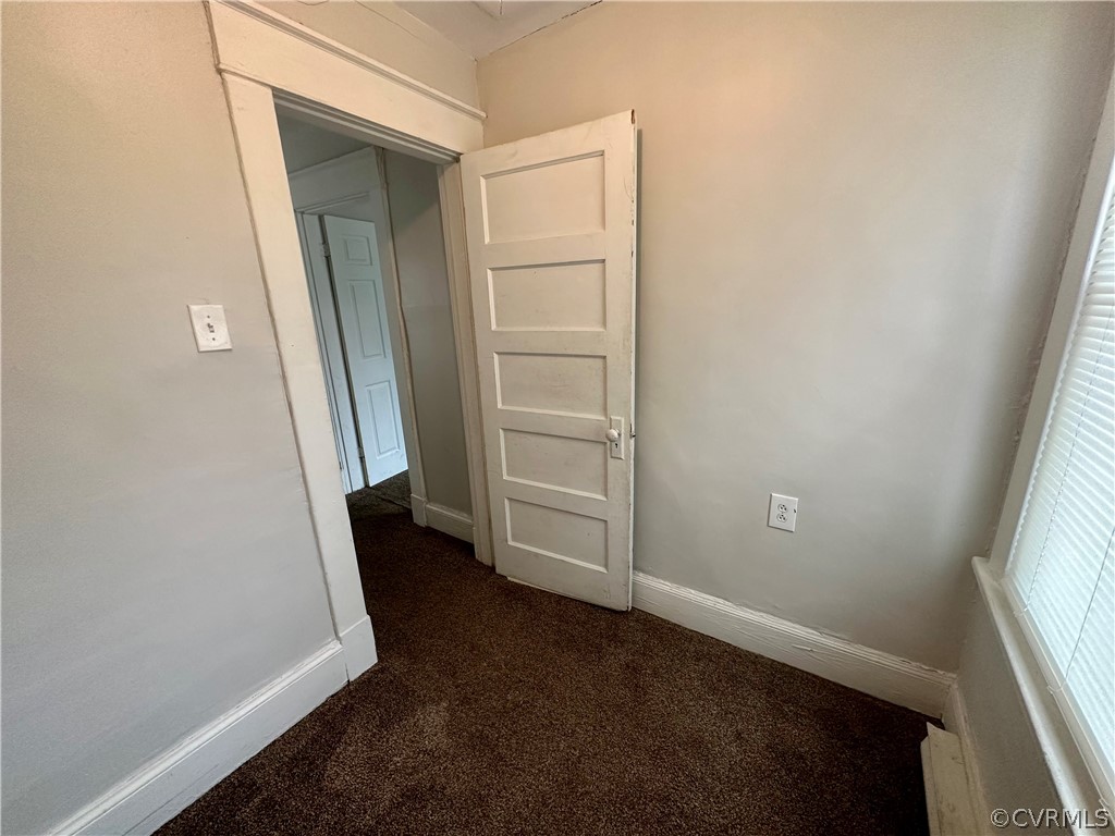 1417 Williamsburg Road Richmond, VA 23231 - Photo 22 of 35 an empty room with a door