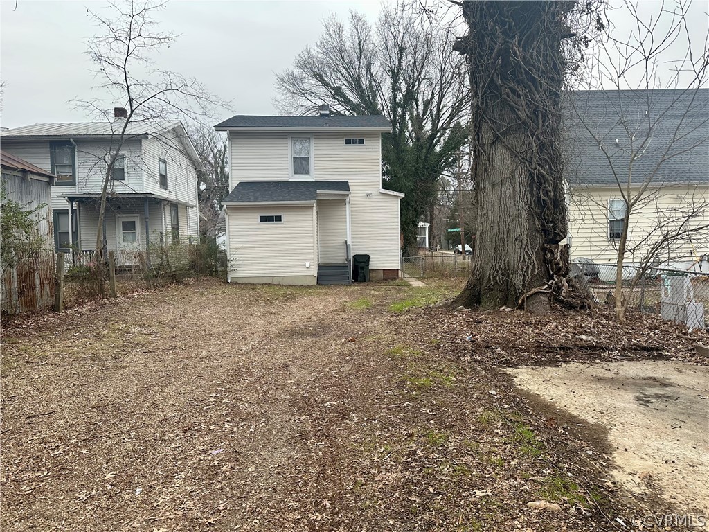 1417 Williamsburg Road Richmond, VA 23231 - Photo 27 of 35 a view of a grey house with a large tree