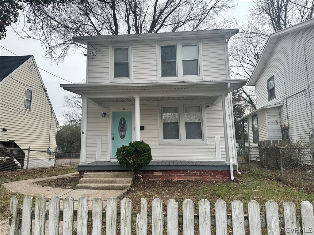 1417 Williamsburg Road Richmond, VA 23231 - Photo 32 of 35 a front view of a house with a porch