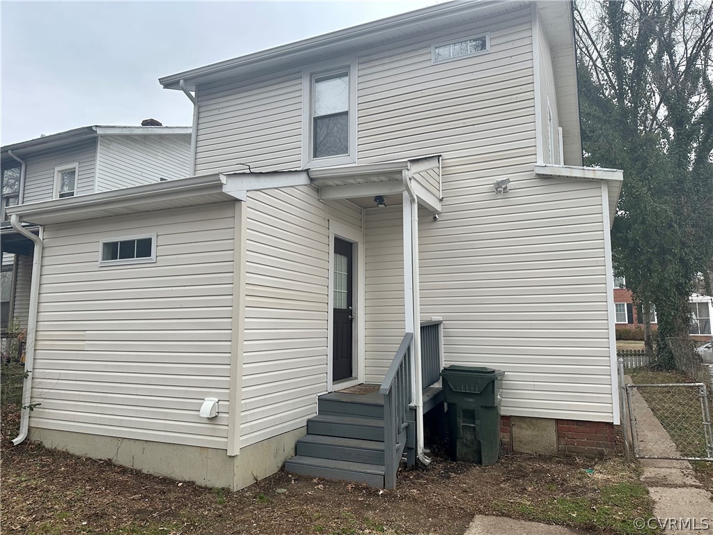 1417 Williamsburg Road Richmond, VA 23231 - Photo 35 of 35 a view of a white house with a white door and large tree