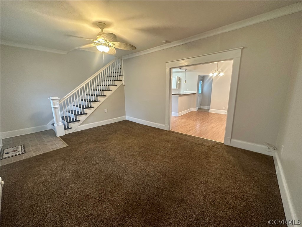 1417 Williamsburg Road Richmond, VA 23231 - Photo 4 of 35 a view of an empty room with stairs and wooden floor