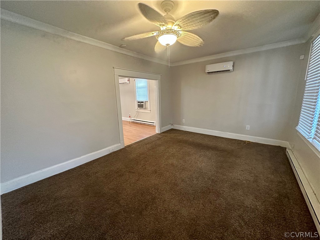 1417 Williamsburg Road Richmond, VA 23231 - Photo 5 of 35 an empty room with windows and fan