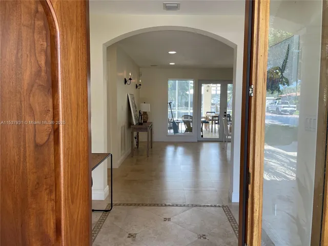 a view of dining room with floor to ceiling window and dining room