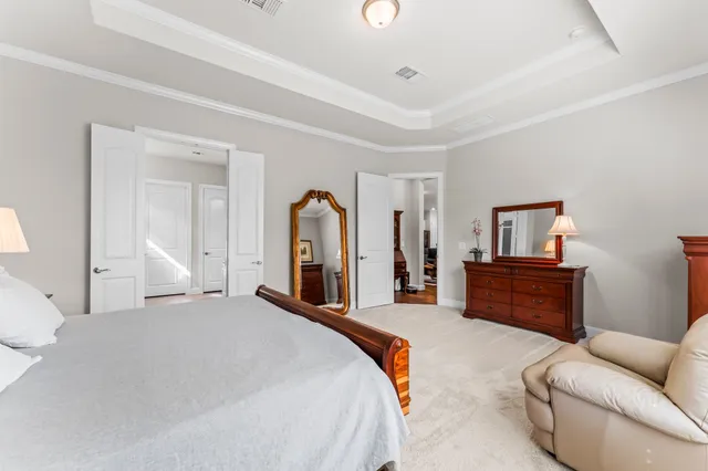 a bed room with a bed and a couch