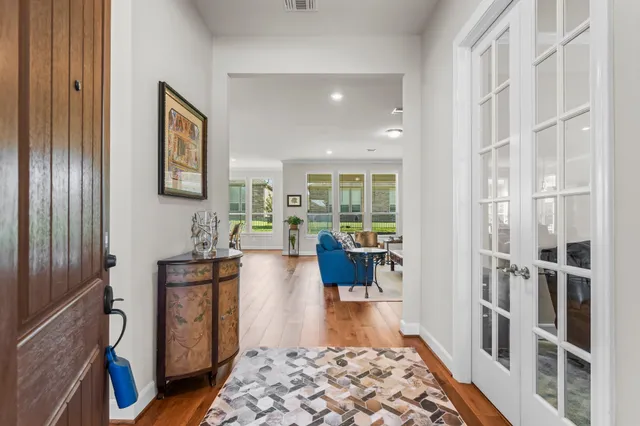 a living room with furniture and a rug
