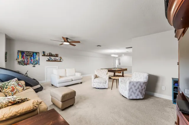 a living room with furniture and a couch