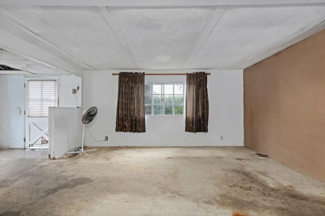 a view of a livingroom with a furniture