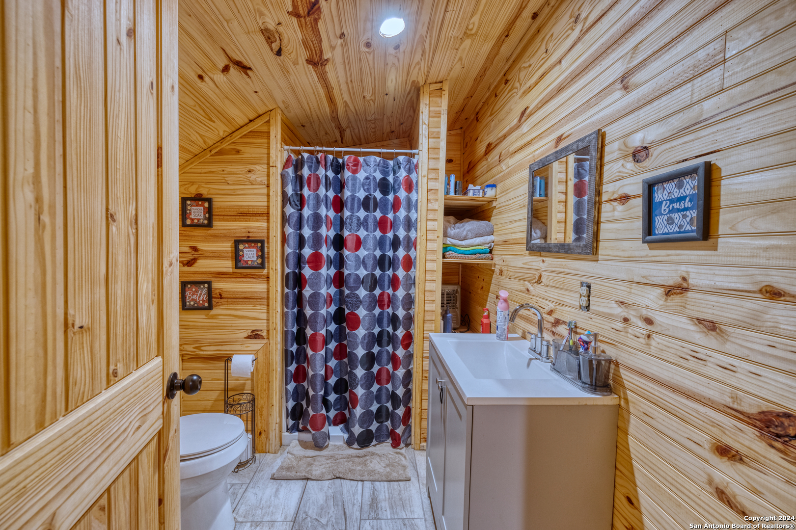 136 Cardinal Drive Camp Wood, TX 78833 - Photo 32 of 62 a bathroom with a sink toilet and shower
