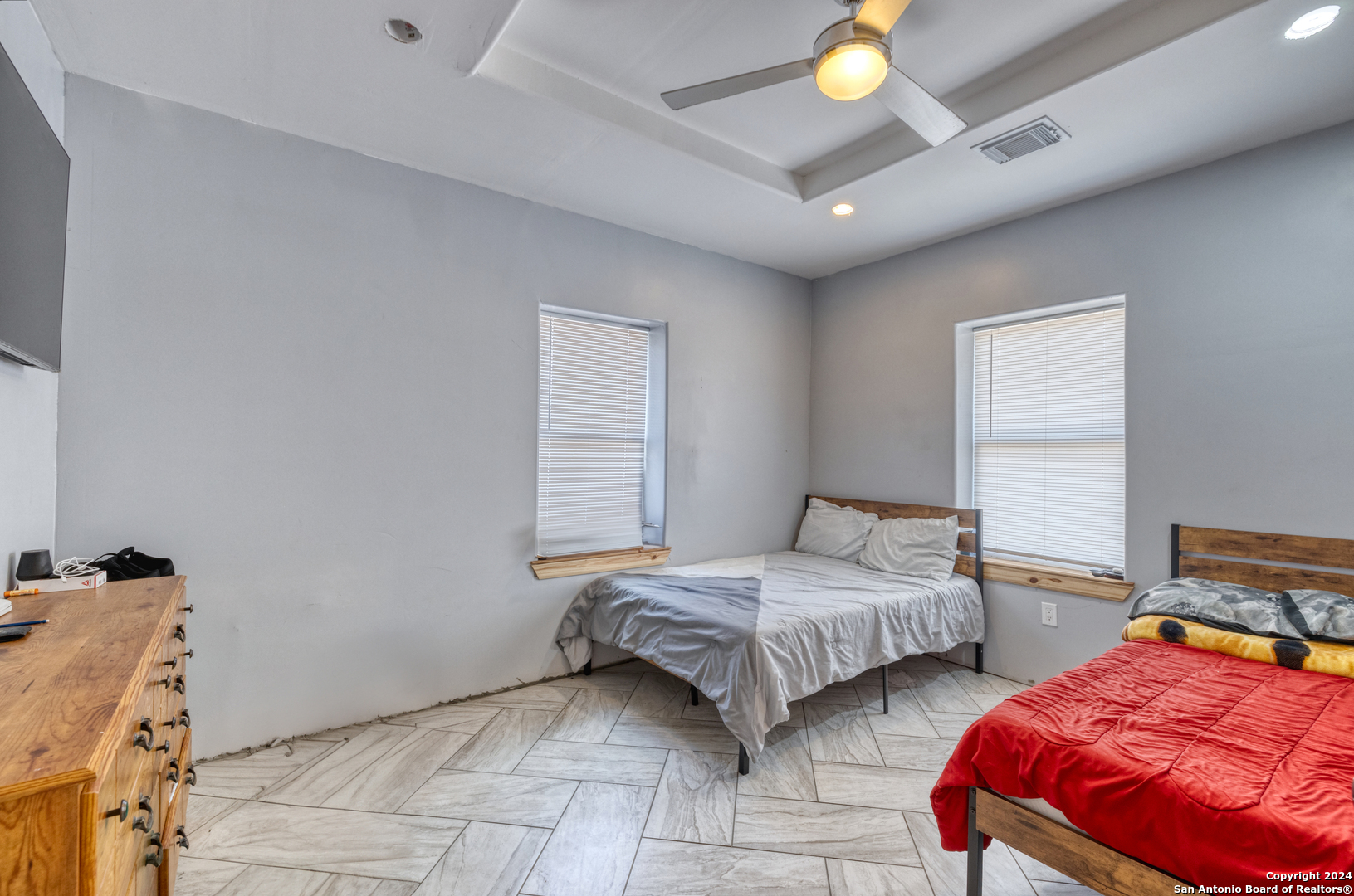 136 Cardinal Drive Camp Wood, TX 78833 - Photo 39 of 62 a bedroom with two beds and lamps