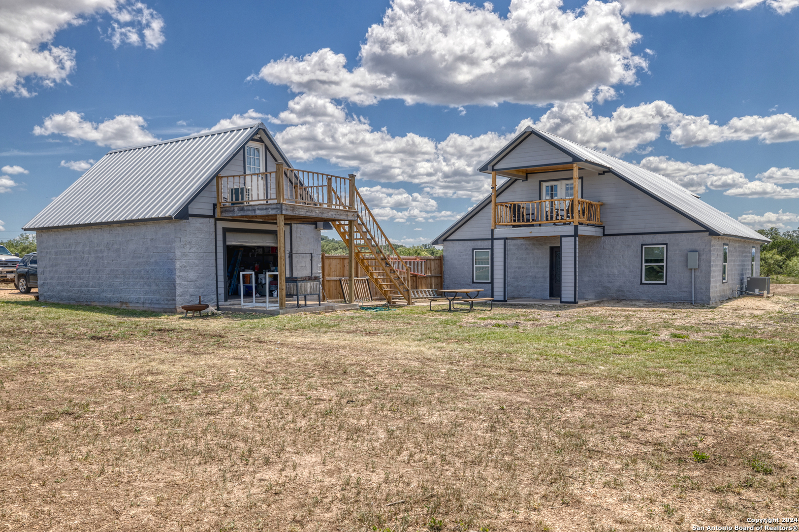 136 Cardinal Drive Camp Wood, TX 78833 - Photo 40 of 62 a view of a house with a yard
