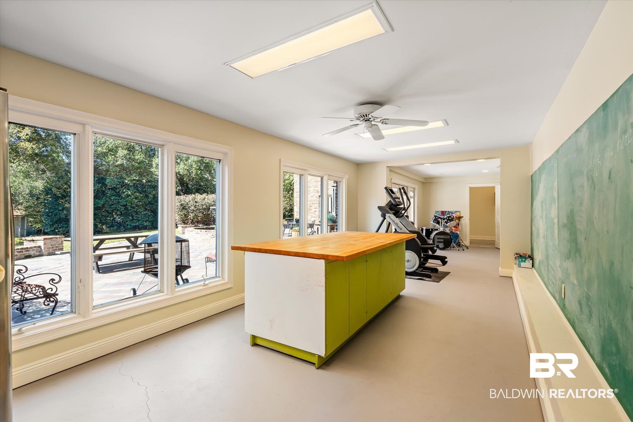 4 Kingsway Mobile, AL 36608 - Photo 31 of 44 Office with baseboards, concrete flooring, and a ceiling fan